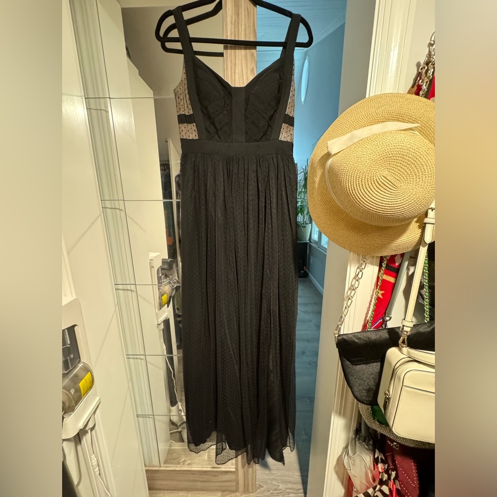 Sleeveless long black dress. Size 4.